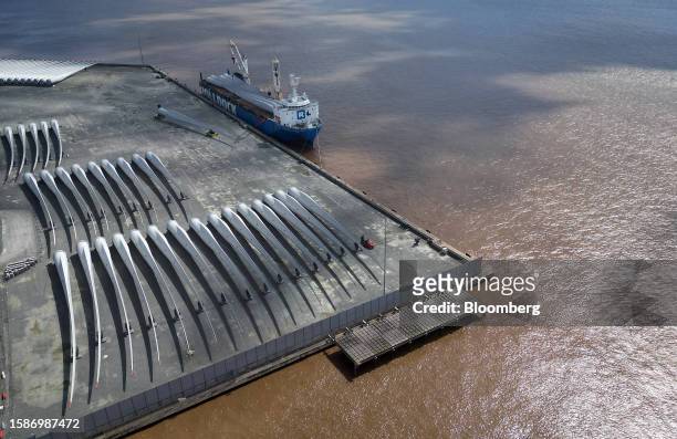 Wind turbine blades dockside ahead of loading onto a ship at the Siemens Gamesa factory in Hull, UK, on Wednesday, Aug. 9, 2023. Siemens Energy AG...