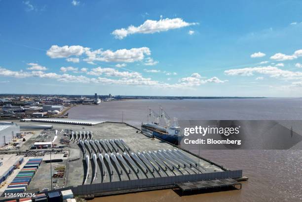 Wind turbine blades are loaded onto a ship at the Siemens Gamesa factory in Hull, UK, on Wednesday, Aug. 9, 2023. Siemens Energy AG launched a...