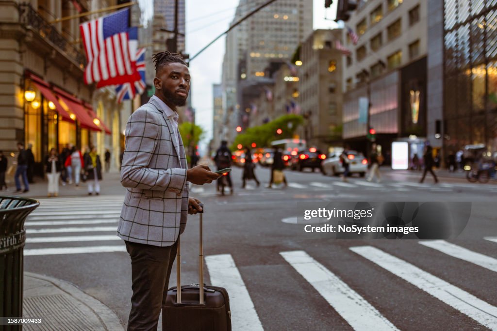 Affluent Images Affluent Black Businessman On A Trip To Nyc Using Mobile Phone App ...