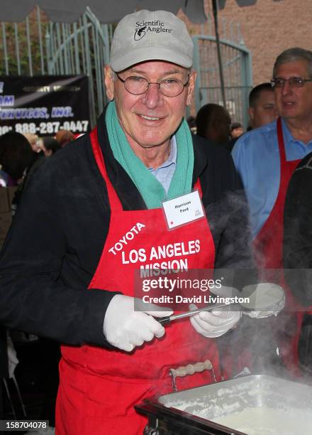 Actor Harrison Ford attends the Los Angeles Mission's Christmas Eve for the homeless at the Los Angeles Mission on December 24, 2012 in Los Angeles,...