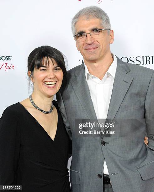 Producer Maria Belon and Enrique Belon arrive at the Los Angeles premiere of 'The Impossible' held at ArcLight Cinemas Cinerama Dome on December 10,...