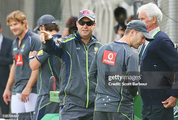 Australian captain Michael Clarke , Australian Chairman of Selectors John Inverarity and Australian coach Mickey Arthur talk as Shane Watson pads up...