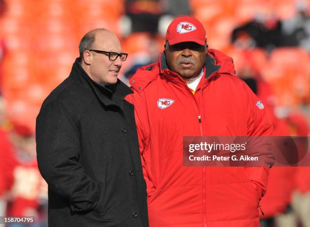 General Manager Scott Pioli talks with head coach Romeo Crennel of the Kansas City Chiefs before a game against the Indianapolis Colts on December...
