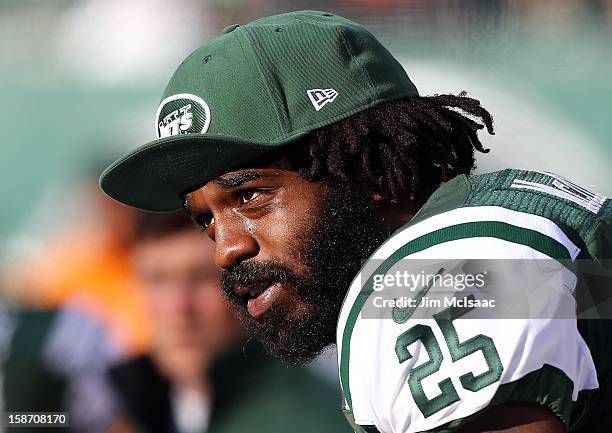 Joe McKnight of the New York Jets looks on against the San Diego Chargers at MetLife Stadium on December 23, 2012 in East Rutherford, New Jersey. The...