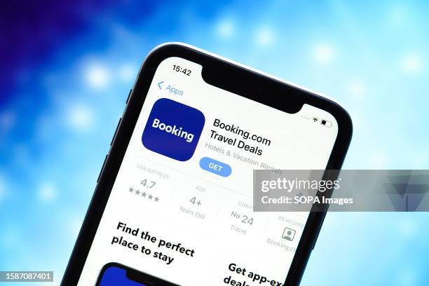 In this photo illustration, the Booking.com logo is displayed in the Apple App Store.