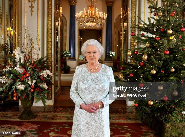 Queen Elizabeth II records her Christmas message to the Commonwealth, in 3D for the first time, in the White Drawing Room at Buckingham Palace on...