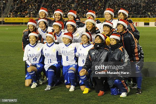 Players pose prior to the Great East Japan Earthquake charity match 'SAWA and Friends, X'mas Night 2012' at the National Stadium on December 25, 2012...