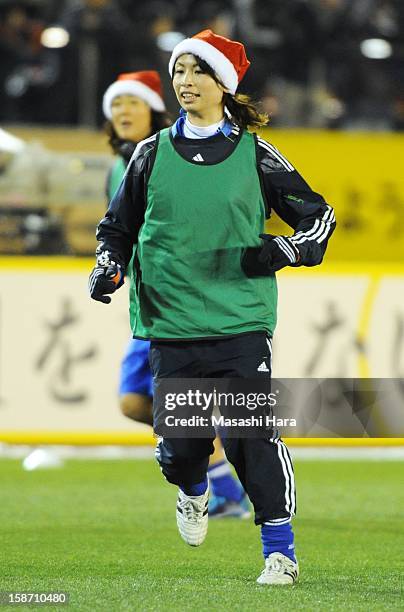 Aya Sameshima warms up prior to the Great East Japan Earthquake charity match 'SAWA and Friends, X'mas Night 2012' at the National Stadium on...