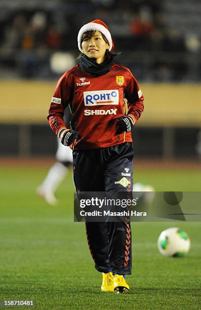 Nahomi Kawasumi warms up prior to the Great East Japan Earthquake charity match 'SAWA and Friends, X'mas Night 2012' at the National Stadium on...