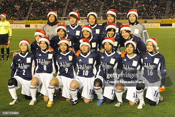 Players pose prior to the Great East Japan Earthquake charity match 'SAWA and Friends, X'mas Night 2012' at the National Stadium on December 25, 2012...