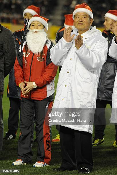 Saori Yoshida and Saburo Kawabuchi look on prior to the Great East Japan Earthquake charity match 'SAWA and Friends, X'mas Night 2012' at the...