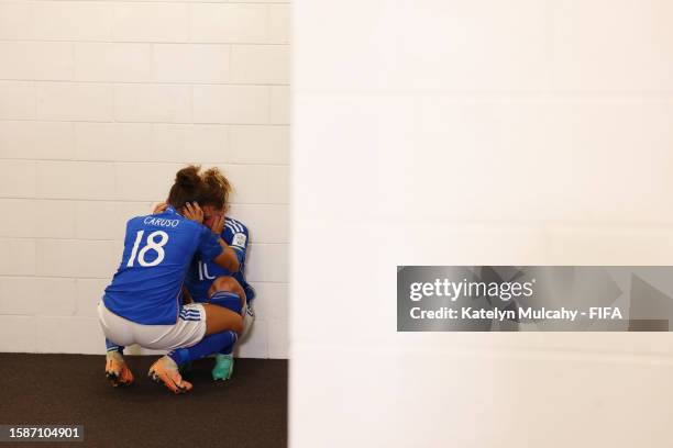 Arianna Caruso and Cristiana Girelli of Italy look dejected after the team's defeat and elimination from the tournament in the FIFA Women's World Cup...