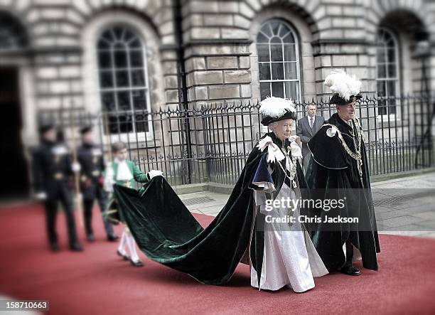 Queen Elizabeth II smiles as she leaves St Giles Cathederal after the Thistle Ceremony on July 5, 2012 in Edinburgh, Scotland. Prince William, Duke...