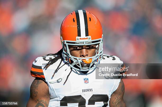 Running back Trent Richardson of the Cleveland Browns warms up before a game against the Denver Broncos at Sports Authority Field at Mile High on...