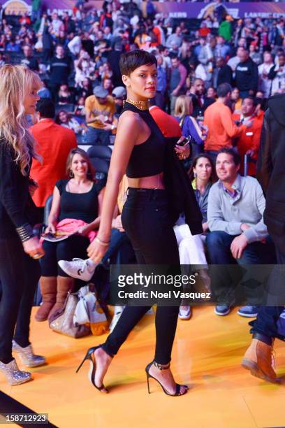 Rihanna attends a basketball game between the New York Knicks and the Los Angeles Lakers at Staples Center on December 25, 2012 in Los Angeles,...