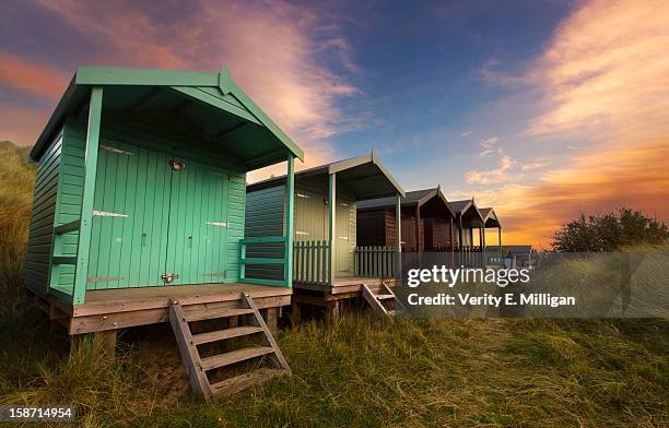 brancaster beach huts at sunrise - norfolk virginia bildbanksfoton och bilder