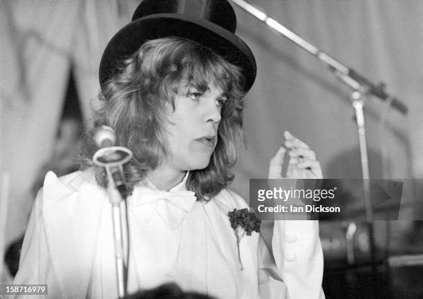 David Johansen of New York Dolls performs on stage at the Rainbow Room at the fashion store Biba in Kensington, London on 26th November 1973.