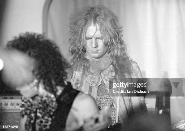 Arthur Kane of New York Dolls performs on stage at the Rainbow Room at the fashion store Biba in Kensington, London on 26th November 1973.