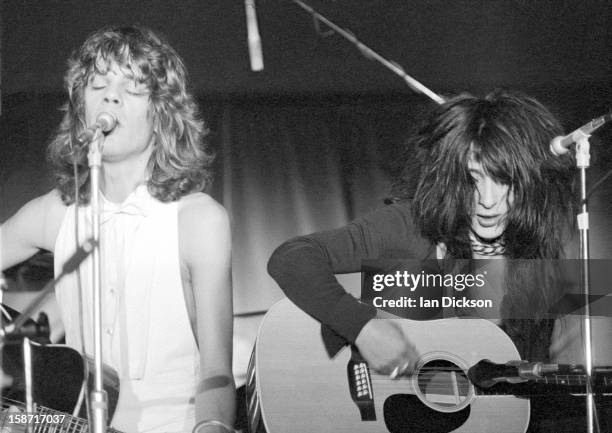 David Johansen and Johnny Thunders of New York Dolls perform on stage at the Rainbow Room at the fashion store Biba in Kensington, London on 26th...