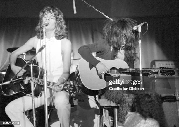 David Johansen and Johnny Thunders of New York Dolls perform on stage at the Rainbow Room at the fashion store Biba in Kensington, London on 26th...