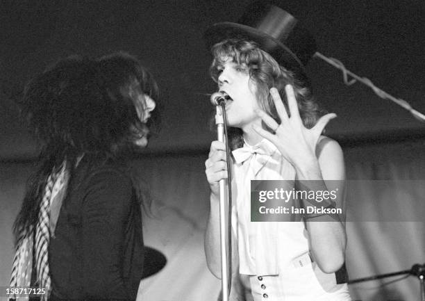 Johnny Thunders and David Johansen of New York Dolls perform on stage at the Rainbow Room at the fashion store Biba in Kensington, London on 26th...