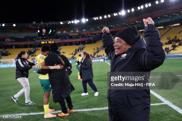 Desiree Ellis, Head Coach of South Africa, celebrates after the team's 3-2 victory and qualification for the knockout stage following the FIFA...