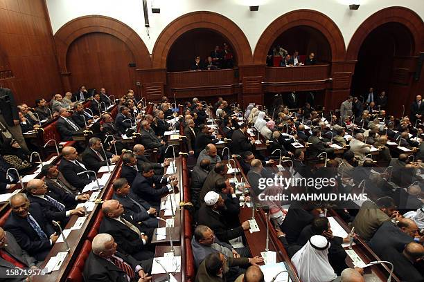 Egyptians members of the Shura Council, the upper house of parliament where the Constituent Assembly drafted the country's new constitution, meet on...