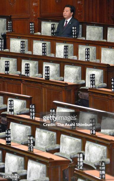 Former Japan's Prime Minister Yoshihiko Noda, who made a general resignation of the cabinet early this morning, attends the diet session at the diet...