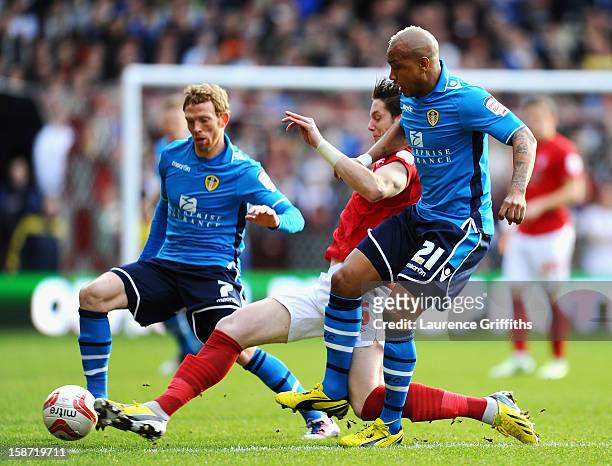 El-Hadji Diouf of Leeds battles with Greg Halford of Nottingham Forest during the npower Championship match between Nottingham Forest and Leeds...