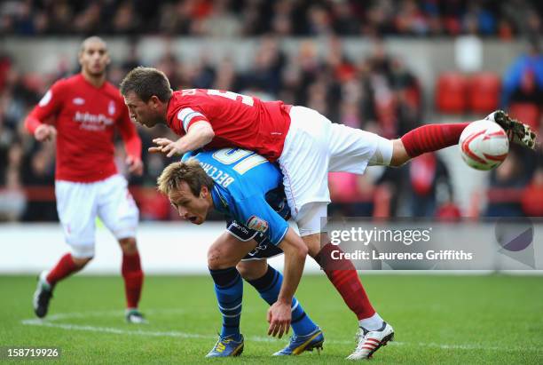 Luciano Becchio of Leeds battles with Danny Collins of Nottingham Forest during the npower Championship match between Nottingham Forest and Leeds...