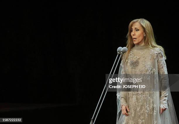 Lebanese diva Fairuz performs during a rare concert in Beirut on October 7, 2010. AFP PHOTO/JOSEPH EID