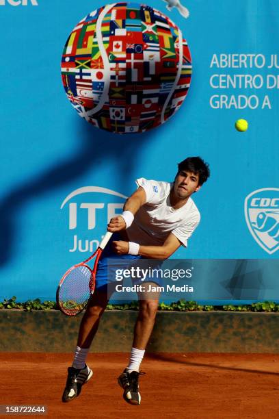 Alexandre Albarici of Brazil serves during the Mexican Youth Tennis Open at Deportivo Chapultepec on December 24, 2012 in Mexico City, Mexico.