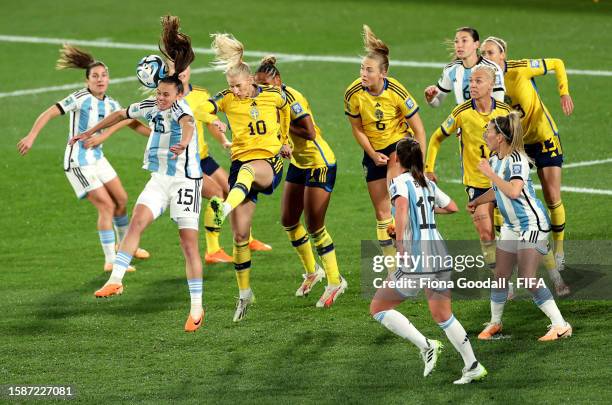 Florencia Bonsegundo of Argentina jumps for the ball with Sofia Jakobsson of Sweden during the FIFA Women's World Cup Australia & New Zealand 2023...