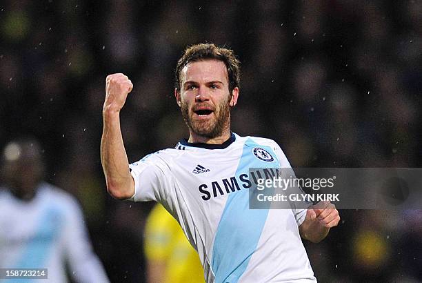 Chelsea's Spanish midfielder Juan Mata celebrates scoring the opening goal of the English Premier League football match between Norwich City and...