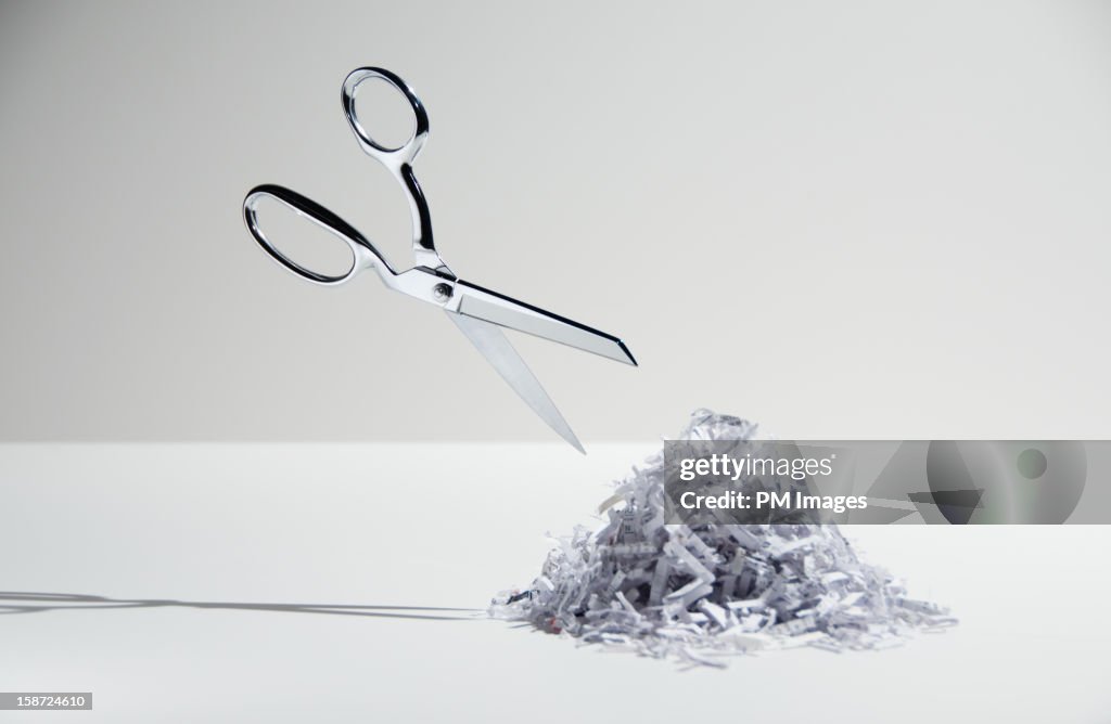 Scissors and shredded paper