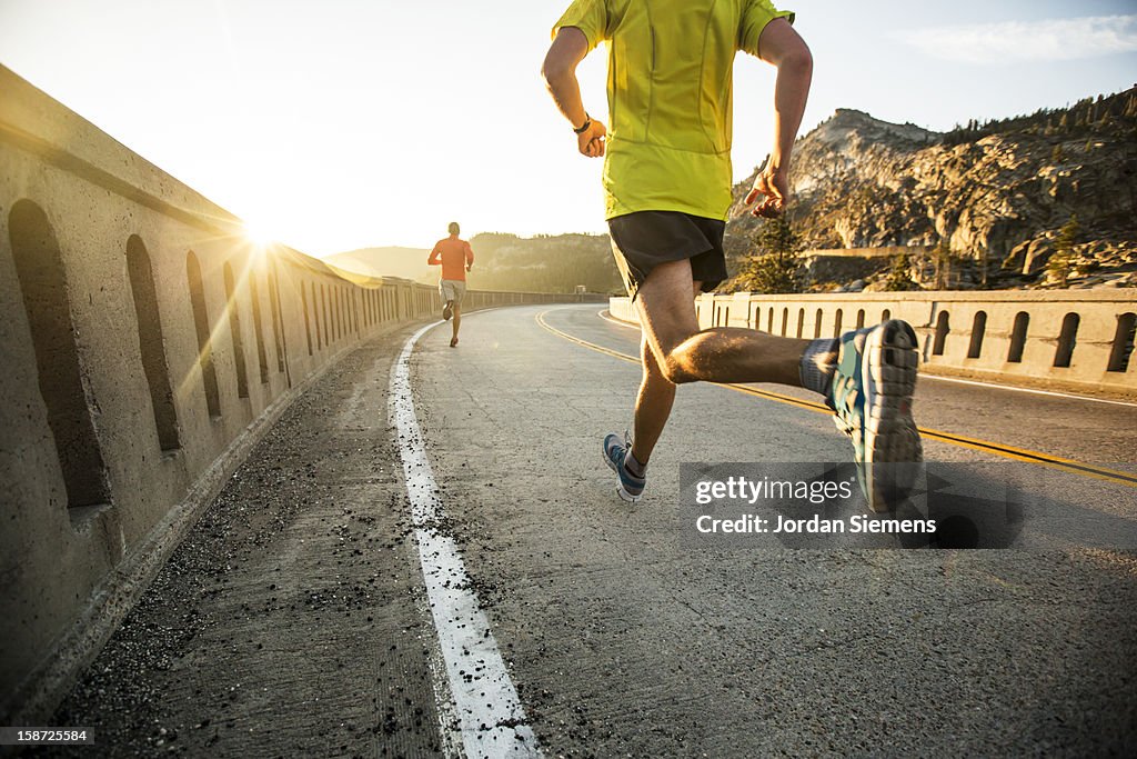 Two men on an early morning run.