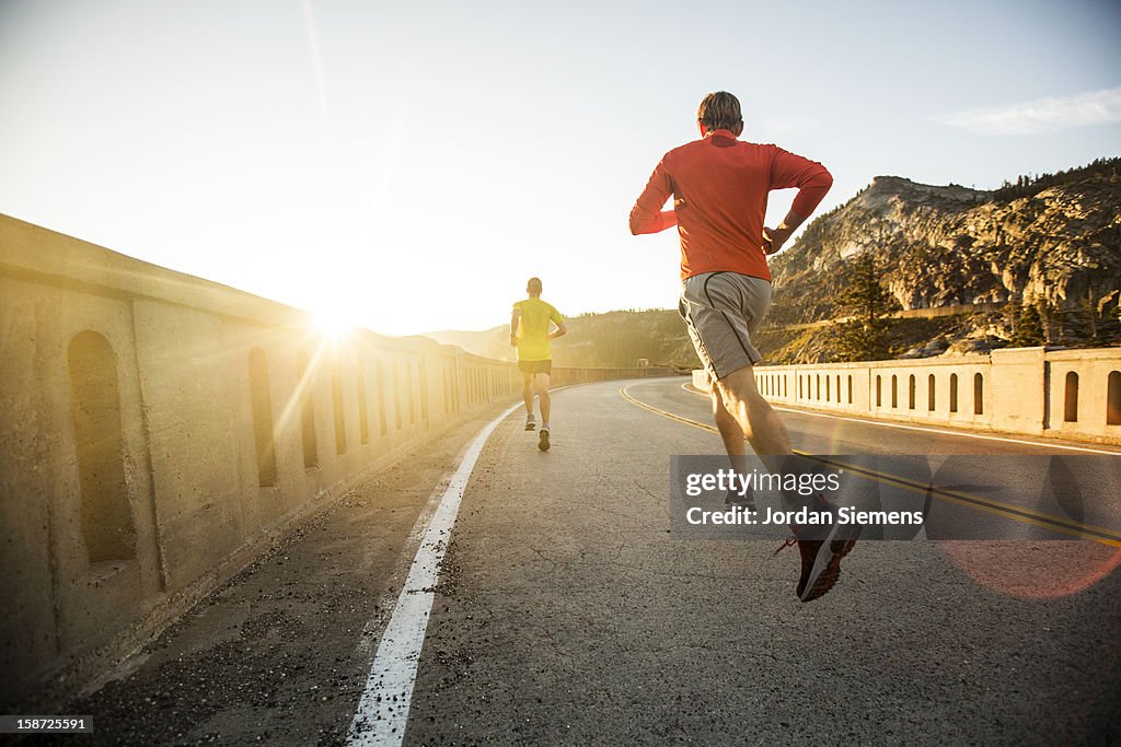 Two men on an early morning run.