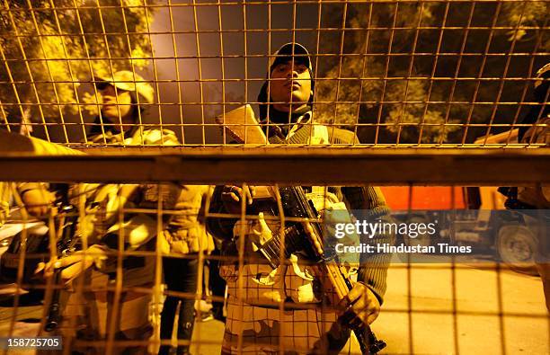 Force on alert in riot gear stand watch at Jantar Mantar following weekend clashes between demonstrators and police on December 26, 2012 in New...