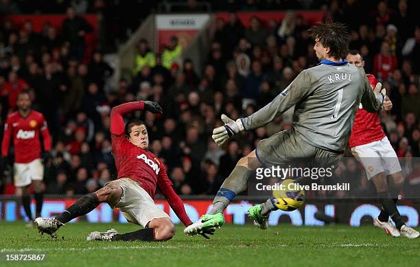 Javier Hernandez of Manchester United scores the winning goal past Tim Krul of Newcastle United during the Barclays Premier League match between...