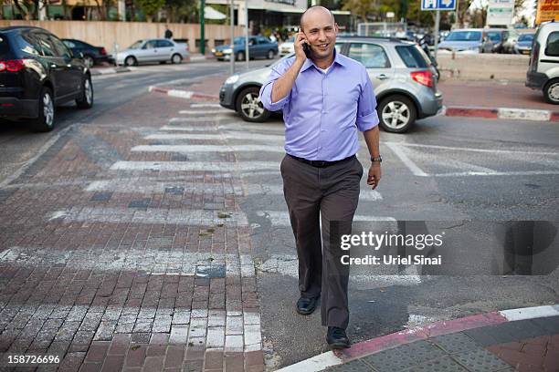 Naftali Bennett Head of HaBayit HaYehudi Party, the Jewish Home party, gives a radio interview over the phone on December 26, 2012 in Tel Aviv,...