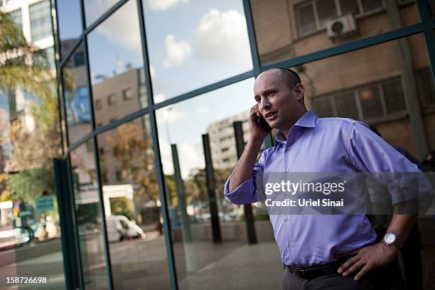 Naftali Bennett Head of HaBayit HaYehudi Party, the Jewish Home party, gives a radio interview over the phone on December 26, 2012 in Tel Aviv,...