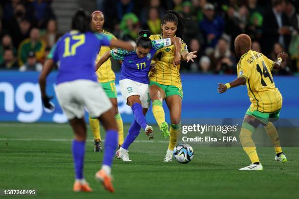 Marta of Brazil shoots whilst under pressure from Chantelle Swaby of Jamaica during the FIFA Women's World Cup Australia & New Zealand 2023 Group F...