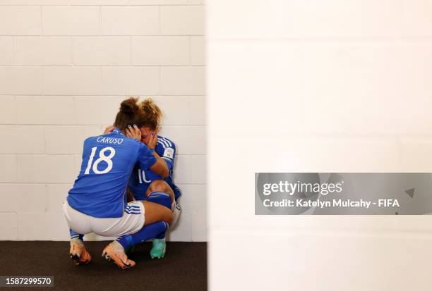 Arianna Caruso and Cristiana Girelli of Italy look dejected after the team's defeat and elimination from the tournament in the FIFA Women's World Cup...