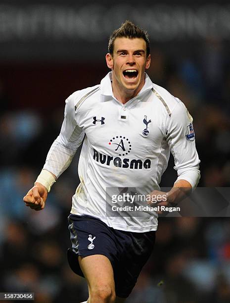 Gareth Bale of Tottenham Hotspur celebrates his hat-trick goal during the Barclays Premier League match between Aston Villa and Tottenham Hotspur at...