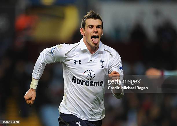 Gareth Bale of Tottenham Hotspur celebrates his hat-trick goal during the Barclays Premier League match between Aston Villa and Tottenham Hotspur at...