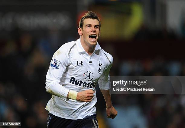 Gareth Bale of Tottenham Hotspur celebrates his hat-trick goal during the Barclays Premier League match between Aston Villa and Tottenham Hotspur at...