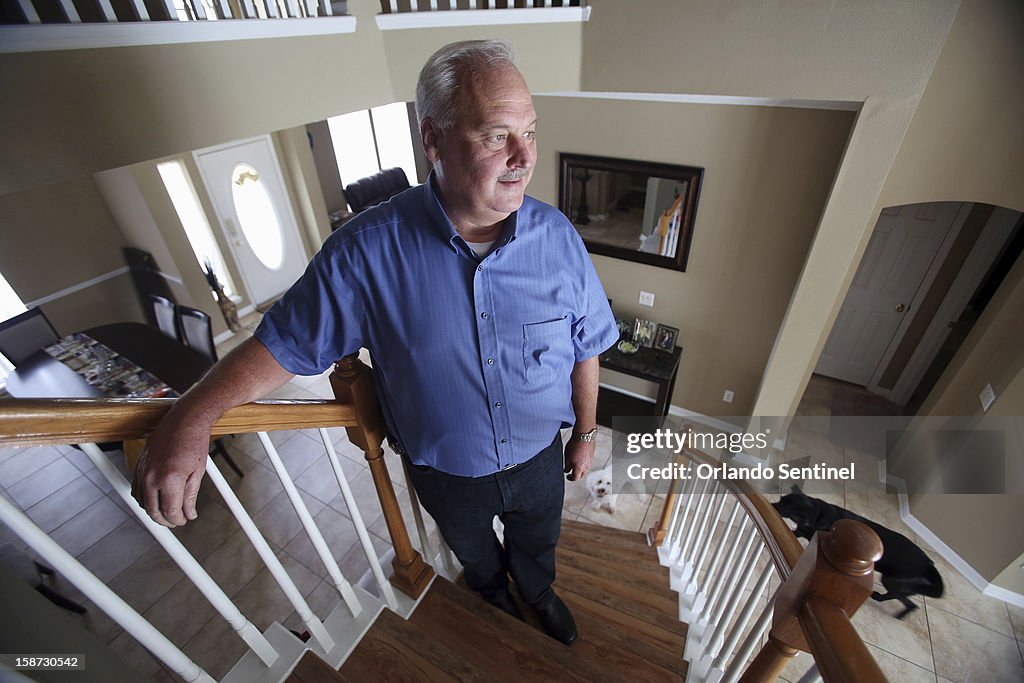 David Hendricks is pictured in his Orlando, Florida home with his ...