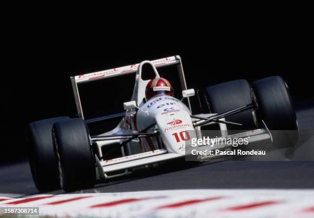 Alex Caffi from Italy drives the Footwork Arrows Racing Arrows A11B Cosworth V8 during practice for the Formula One Italian Grand Prix on 8th...