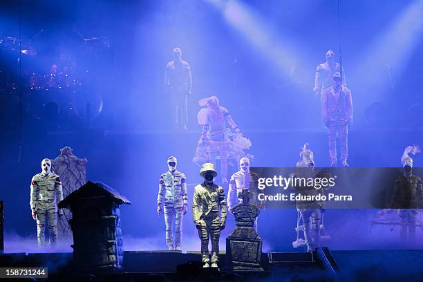 Dancers of the company 'Cirque du Soleil' dance in the show 'Michael Jackson Immortal World Tour' at Madrid Sports Palace on December 26, 2012 in...