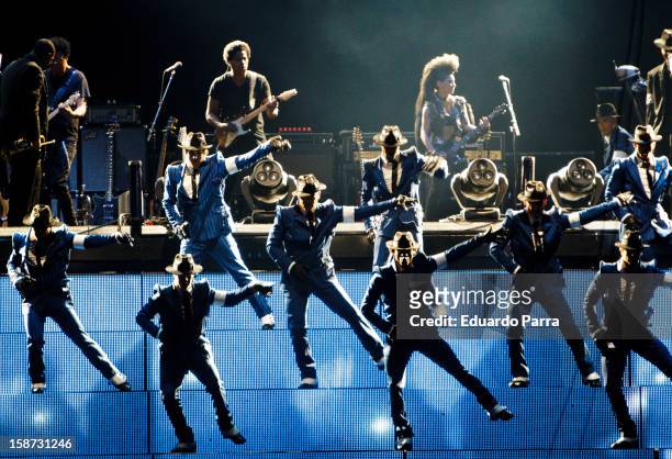 Dancers of the company 'Cirque du Soleil' dance in the show 'Michael Jackson Immortal World Tour' at Madrid Sports Palace on December 26, 2012 in...